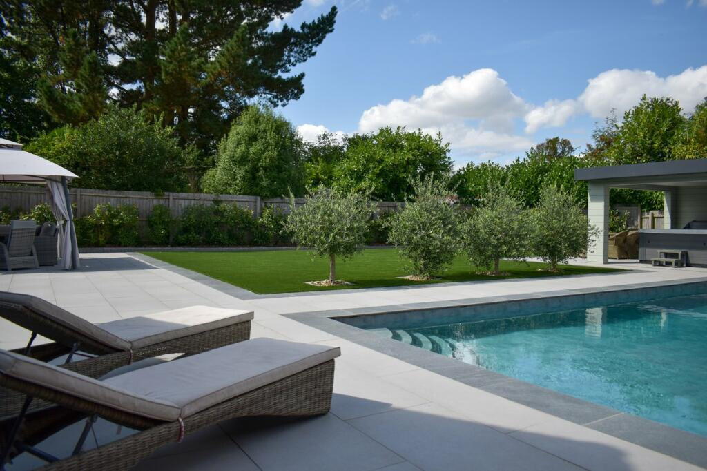 Luxury poolside patio landscaping