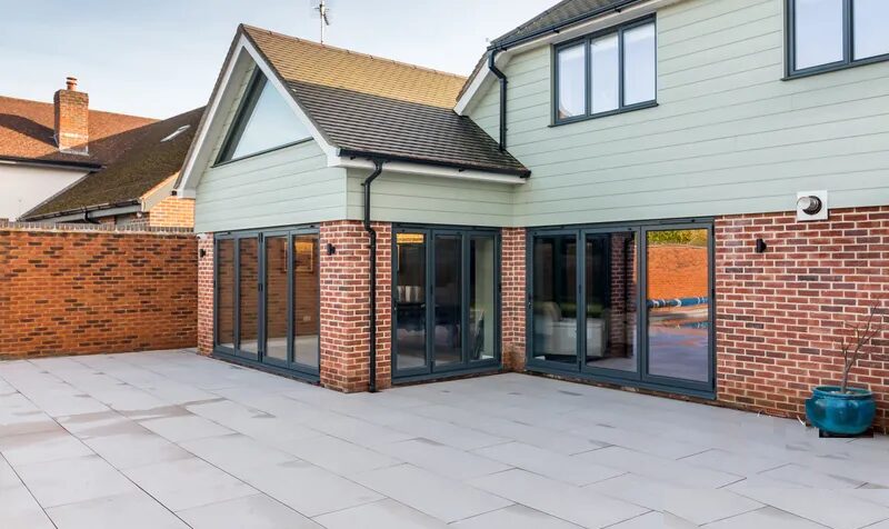 Completed natural stone patio installed by White & Sons in Dorset & Hampshire